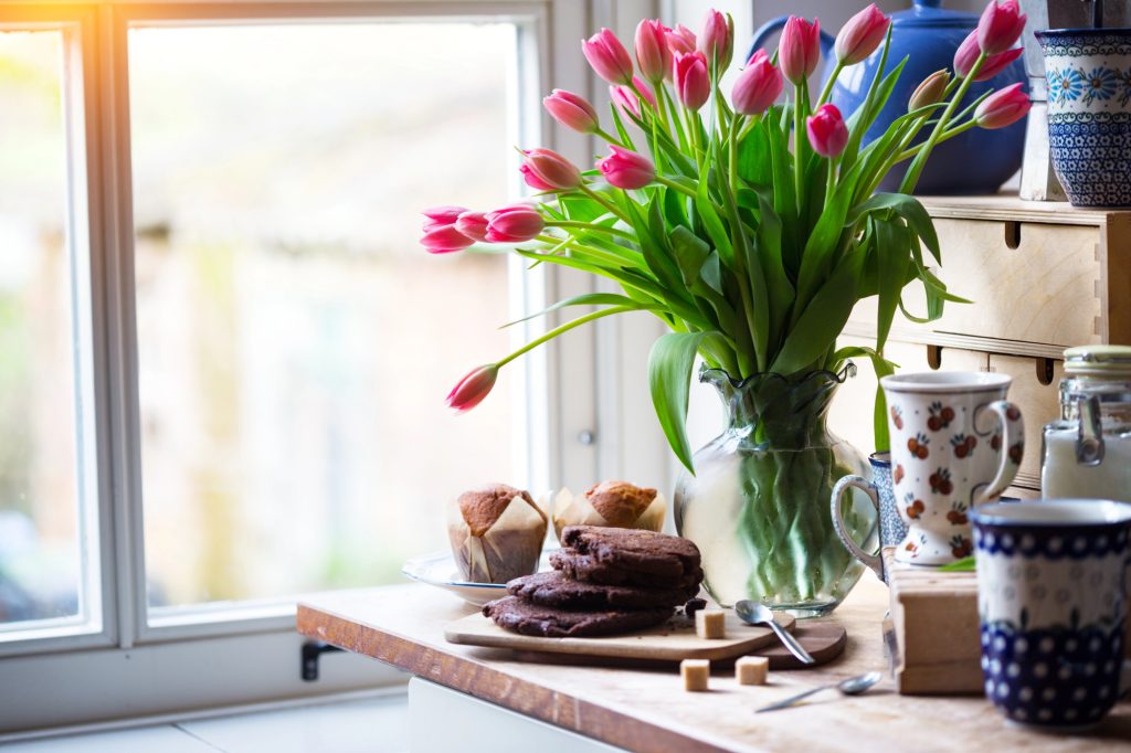 A vase of tulips on a countertop brings spring inside, the perfect start to spring decorating in East Tennessee